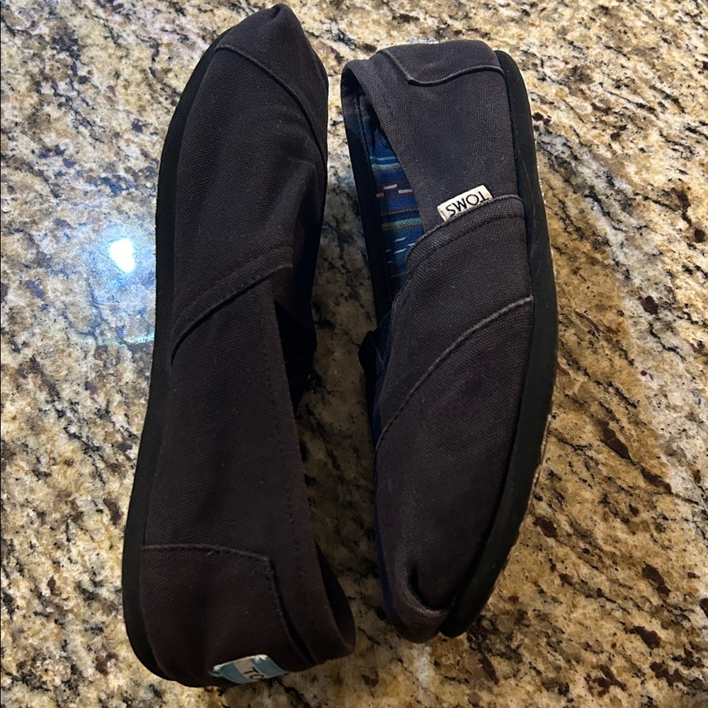 TOMS Classic Black Canvas Slip-Ons